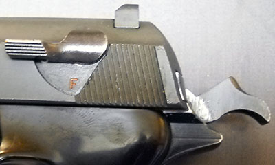 detail, P38 safety off, hammer cocked